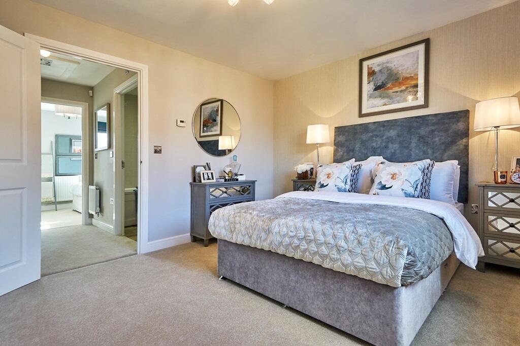 Bedroom one is welcoming and spacious