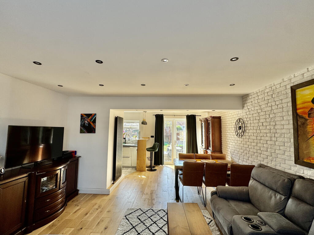 Sitting room diner through to kitchen