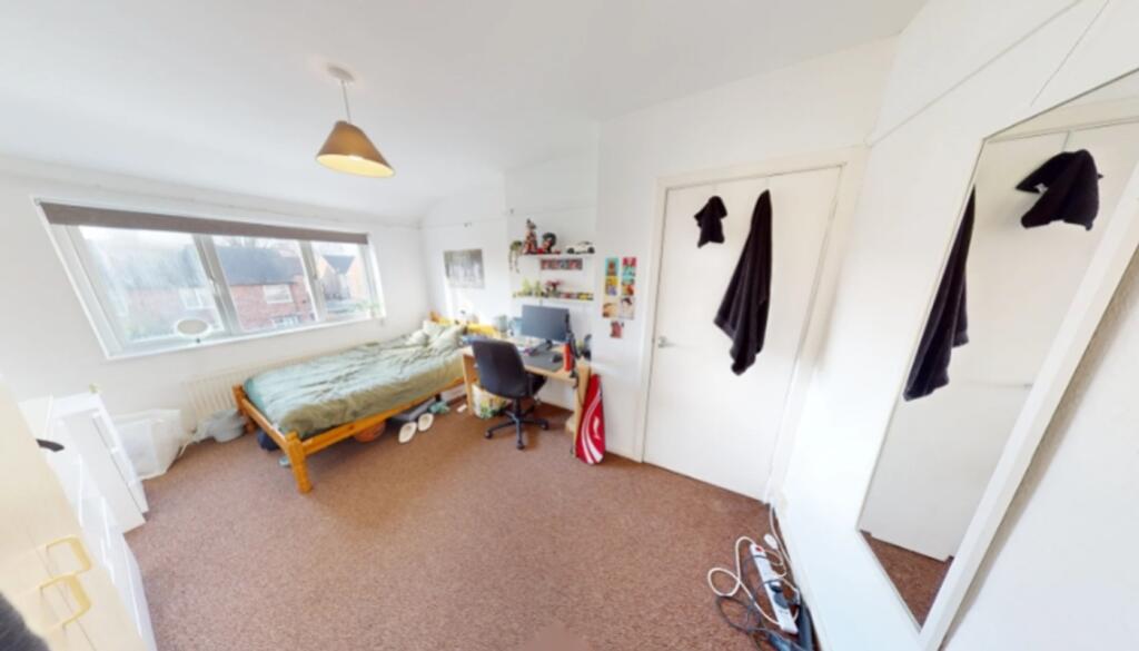 A spacious and bright double bedroom, perfect f...