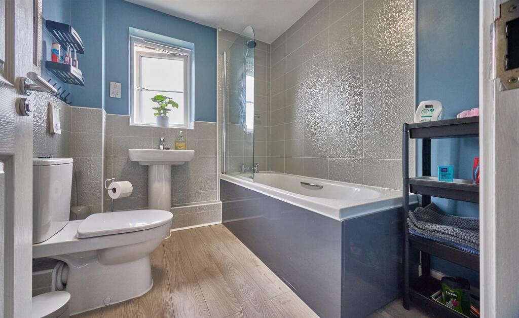 Family bathroom to rear