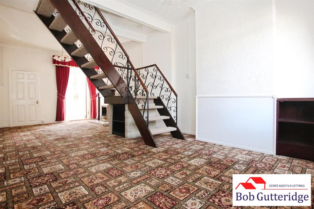 THROUGH LOUNGE / DINING ROOM