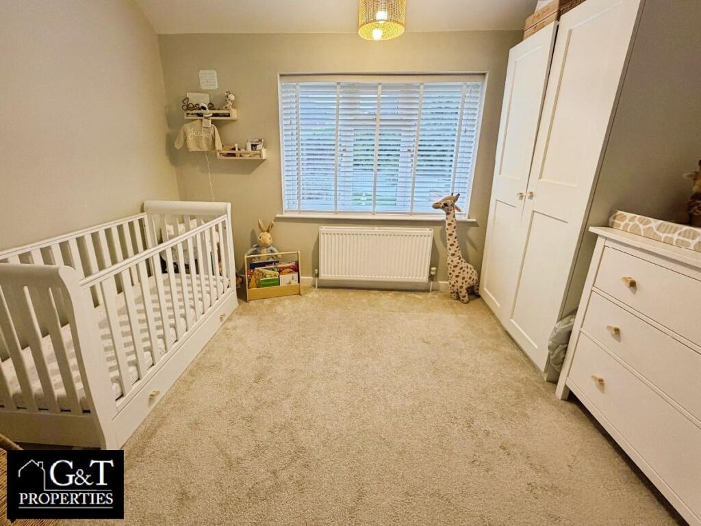 SECOND BEDROOM