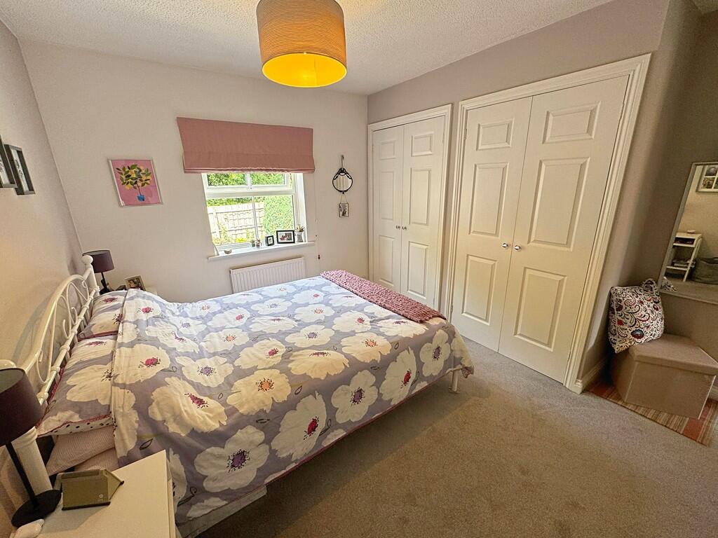 Bed 1 to wardrobe