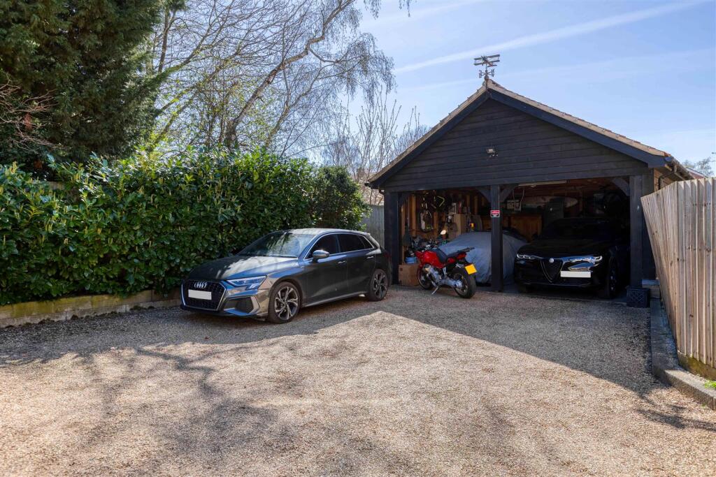 Double car barn and parking