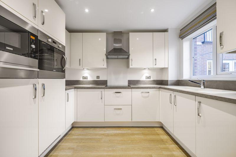 Kitchen with built-in appliances
