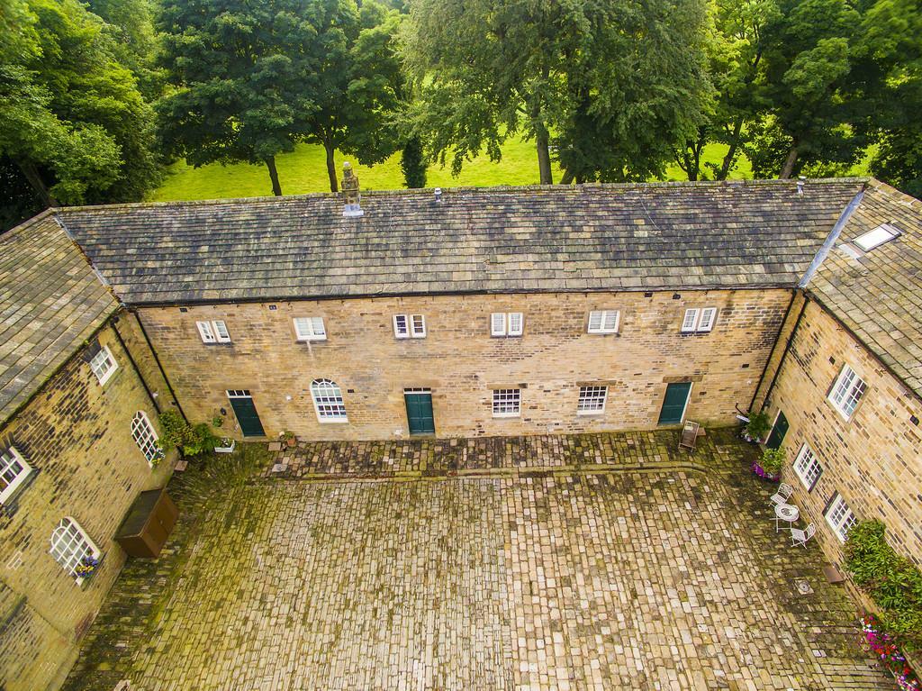 elevated view of front from courtyard.jpg