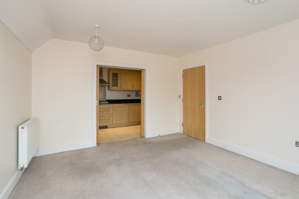 Sitting/Dining Room to Kitchen