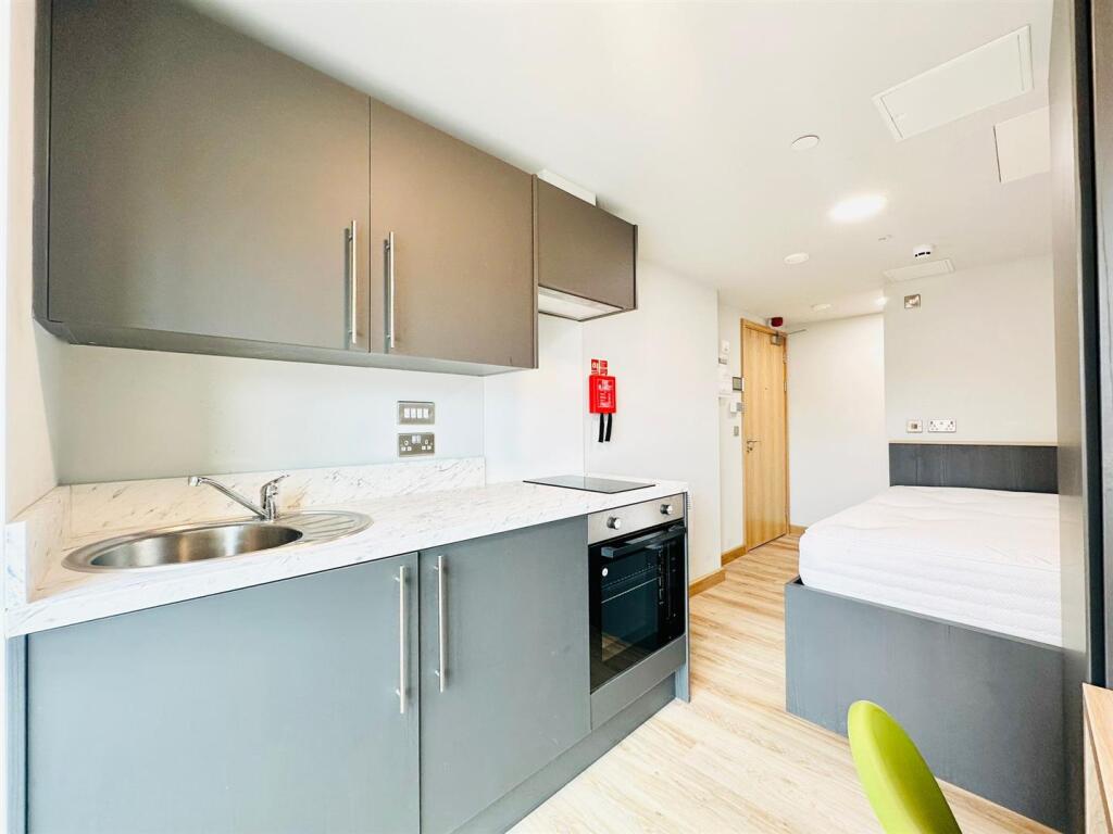Kitchen and bed