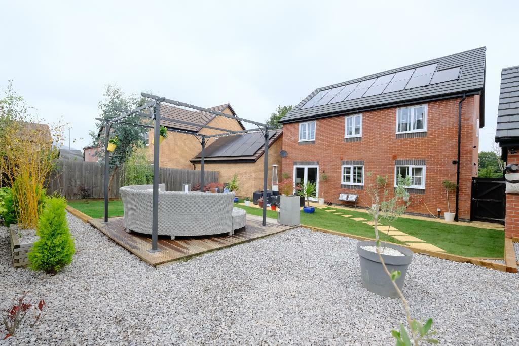 Large flat rear garden with deck area