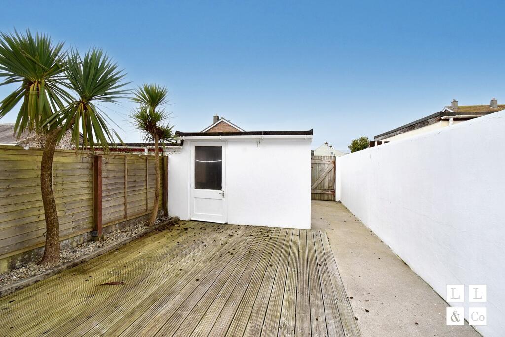 Rear courtyard and garage