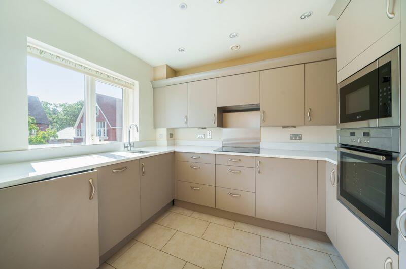 Kitchen with built-in appliances