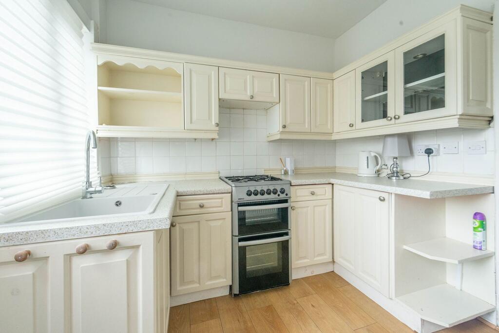 SITTING ROOM KITCHEN AND UTILITY