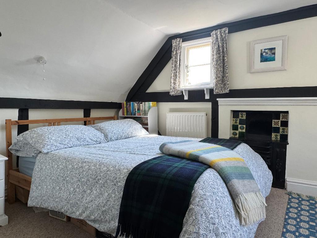 Bedroom 2 with original fireplace
