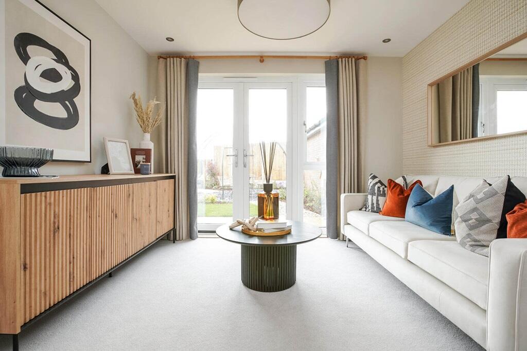 Double doors also lead from the lounge to the garden