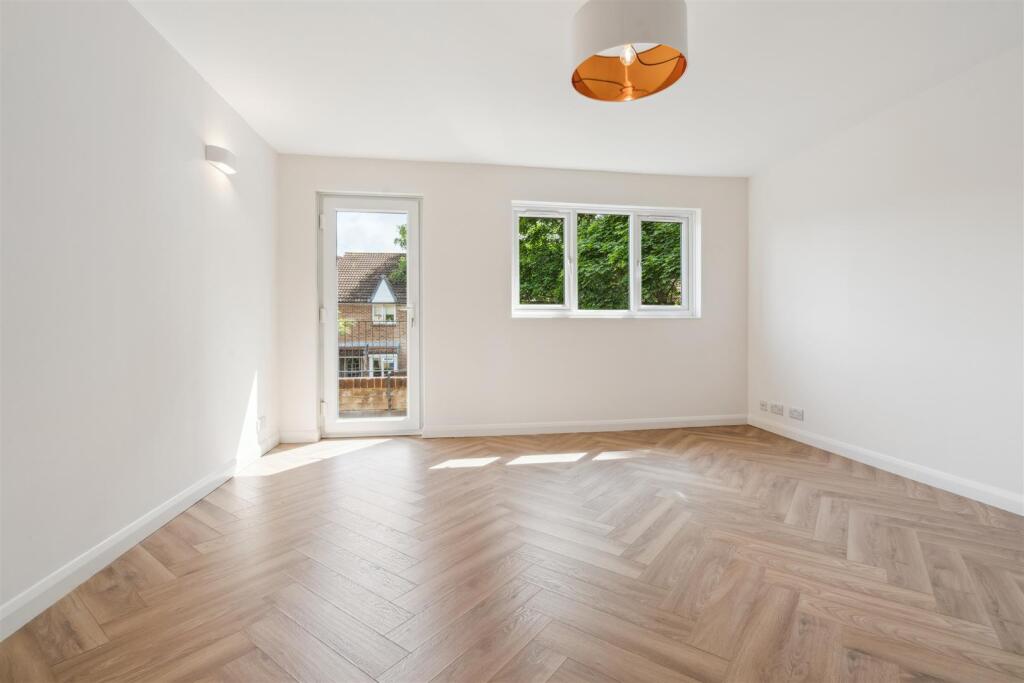 4 Landseer Close SW19 2UT reception 1.jpg