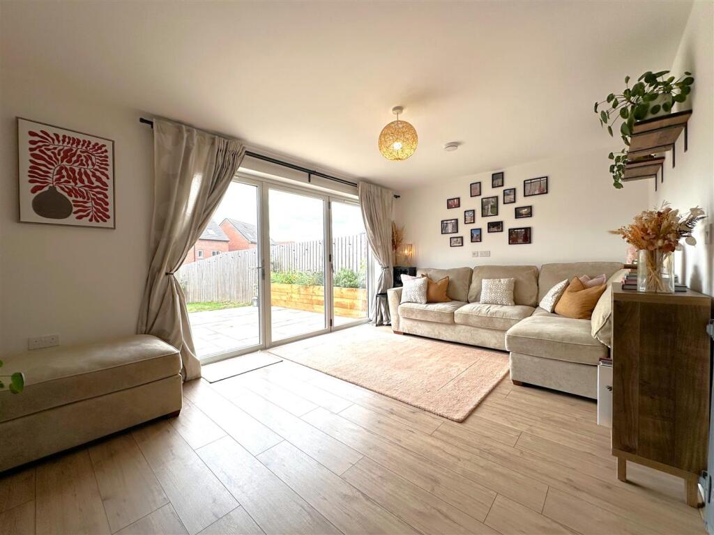 Living Room With BI-FOLD Doors 775
