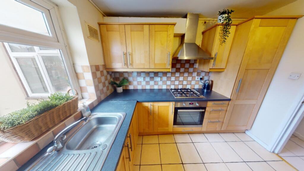 A bright and well-maintained kitchen featuring ...