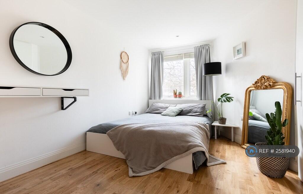 Large Bedroom With a Spacious Built-In Wardrobe