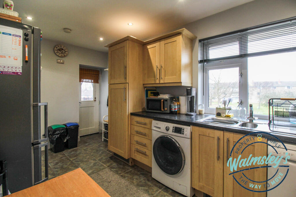 Kitchen with door to balcony
