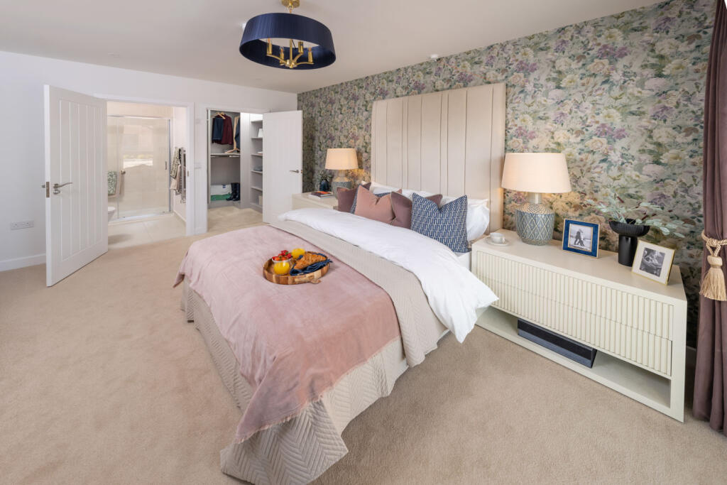 Typical bedroom, also showing ensuite and walk in wardrobe