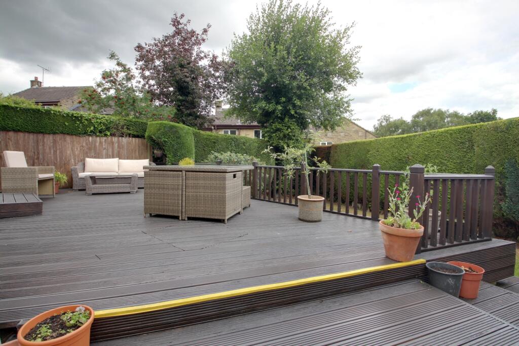 Part of the back garden showing the deck