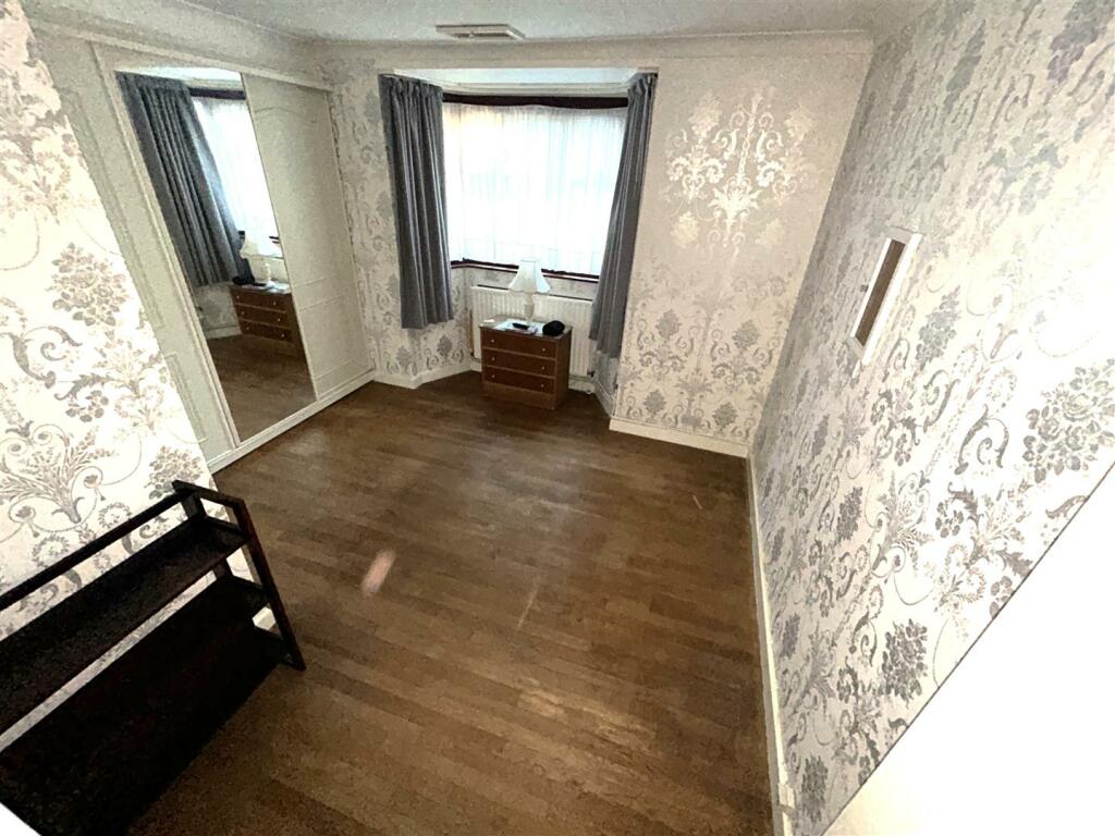 BEDROOM ONE (into bay and to wardrobes)