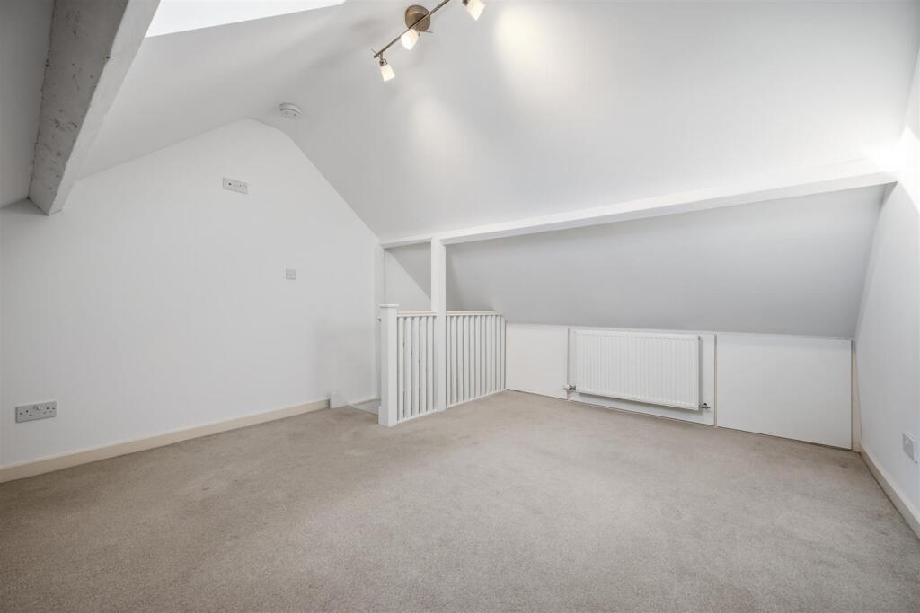 Bedroom Two to stairs.jpg