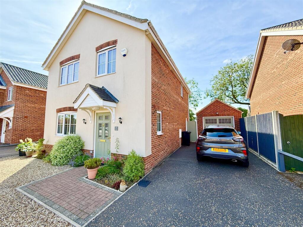 front aspect and driveway