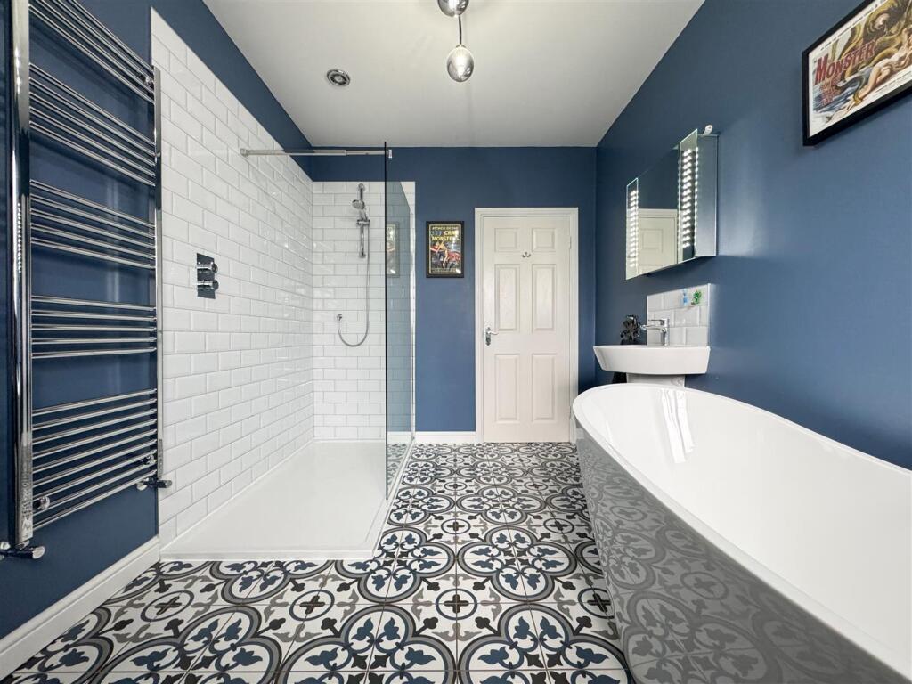 FAMILY BATH AND SHOWER ROOM
