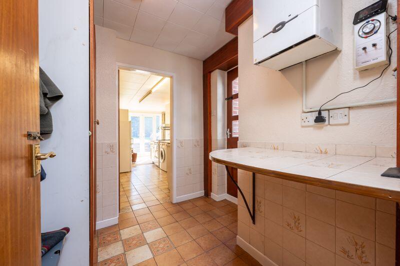 UTILITY ROOM into KITCHEN