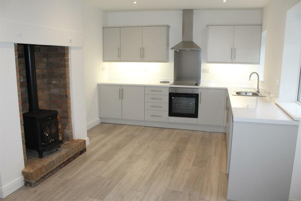 DINING AREA AND KITCHEN