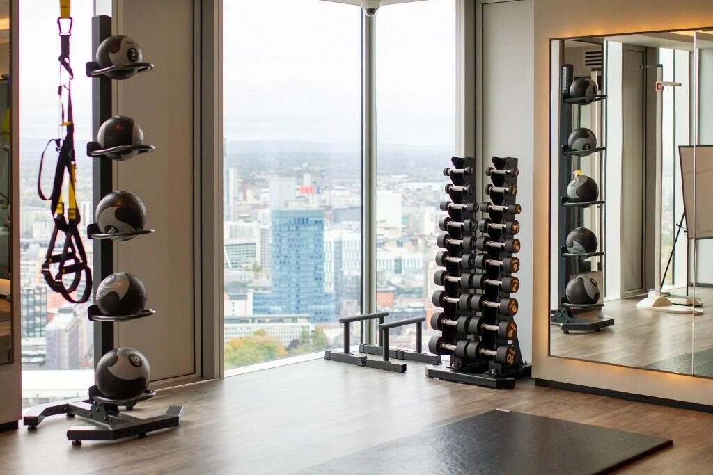 Gym with city views