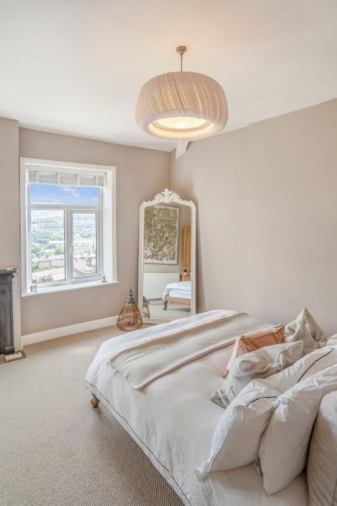 Spacious and Serene Master Bedroom