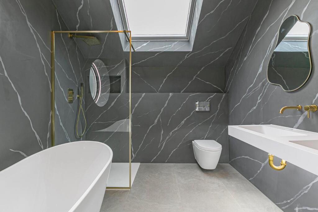 property in Grand Drive, 
Raynes Park, SW20