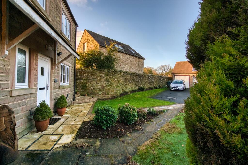 Front garden, driveway and garage.jpg