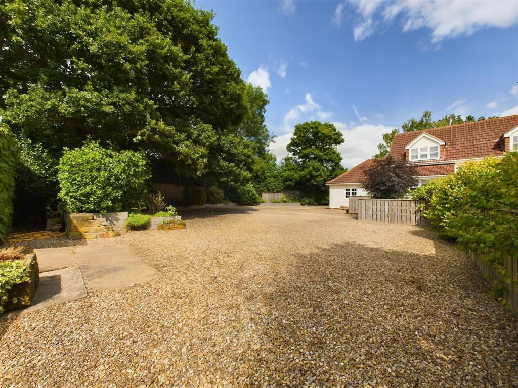Gravelled Drive Side and Rear