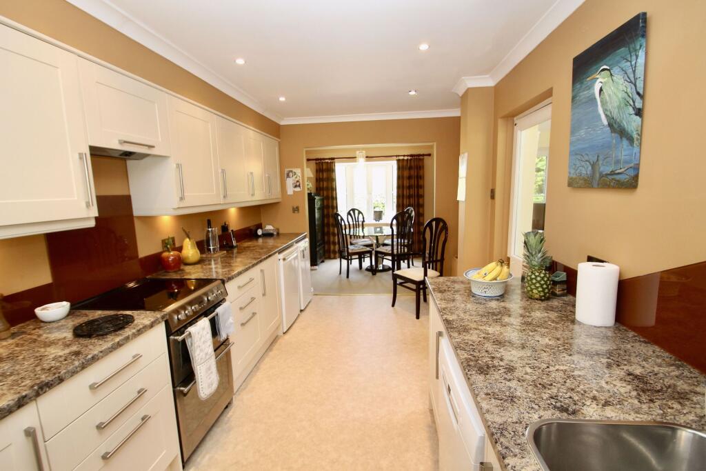 Kitchen with dining area off