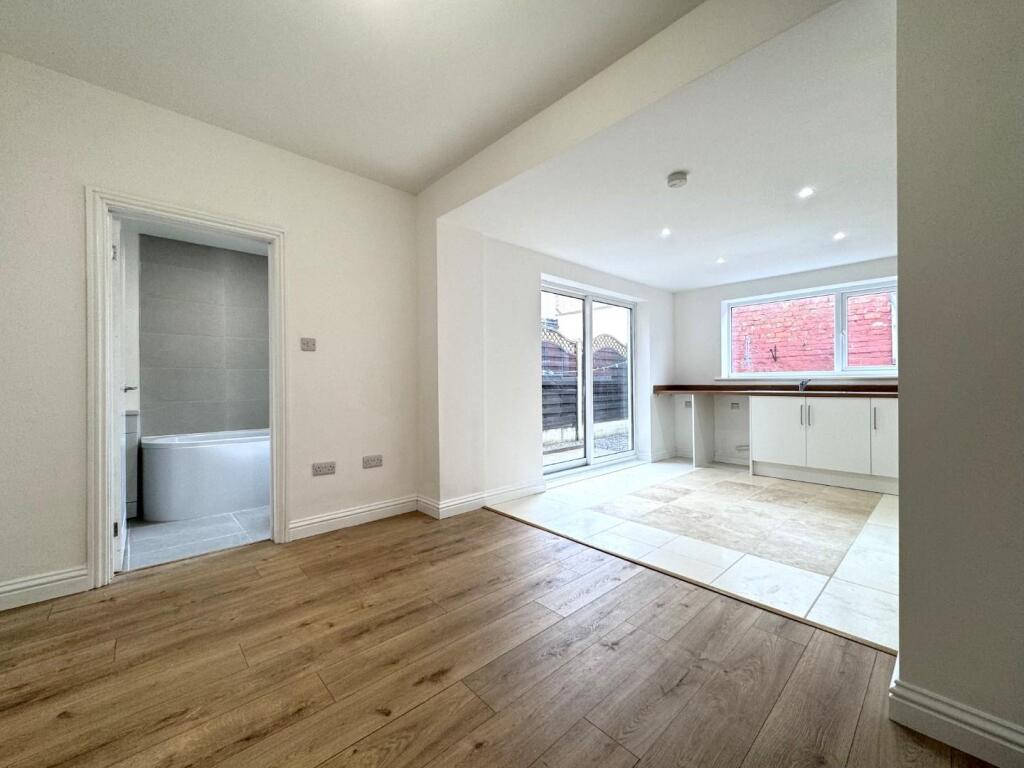 DINING AREA INTO KITCHEN