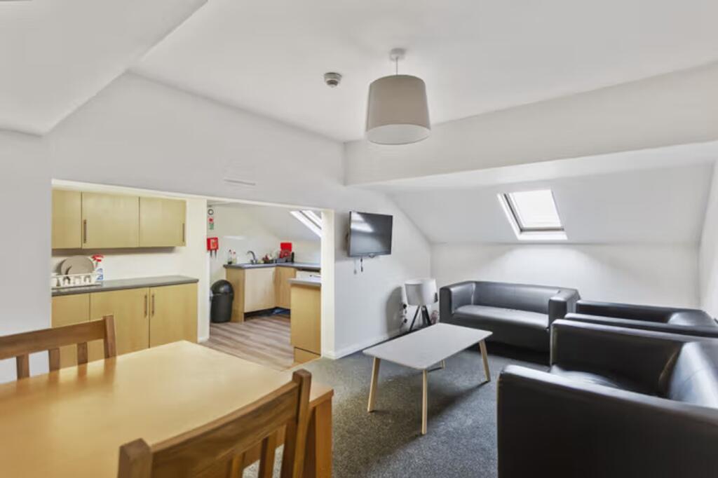 A spacious and inviting large modern living roo...