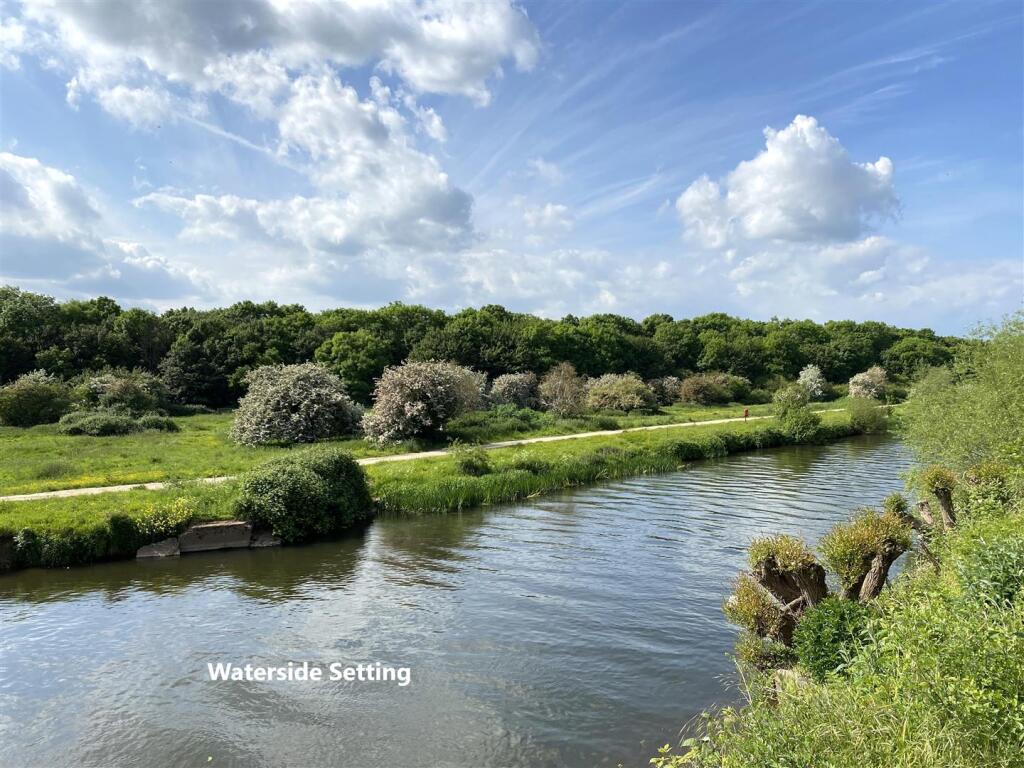 Delightful Riverside Setting 718