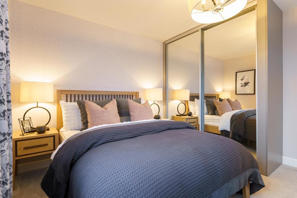 The luxurious main bedroom is perfect space to relax in