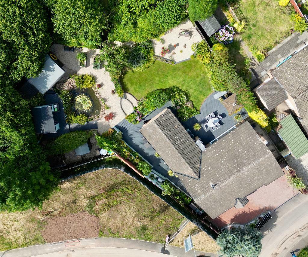 Aerial view of the bungalow and gardens