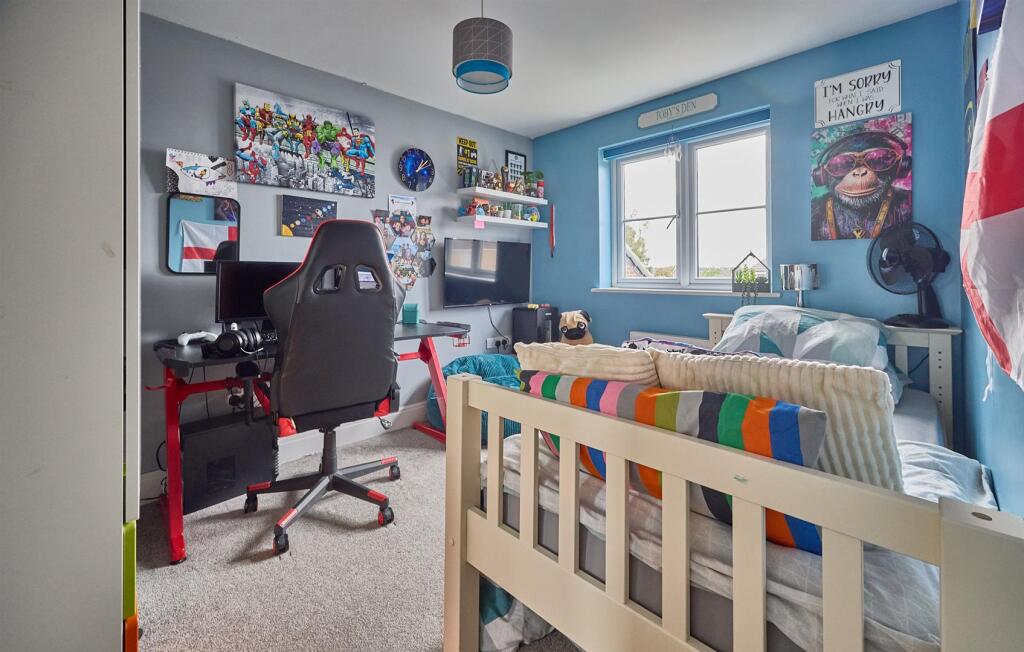 Bedroom four to rear