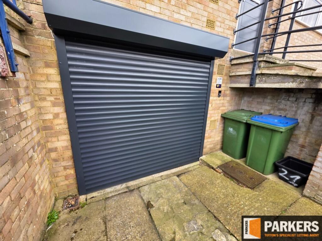 Powered garage / basement door