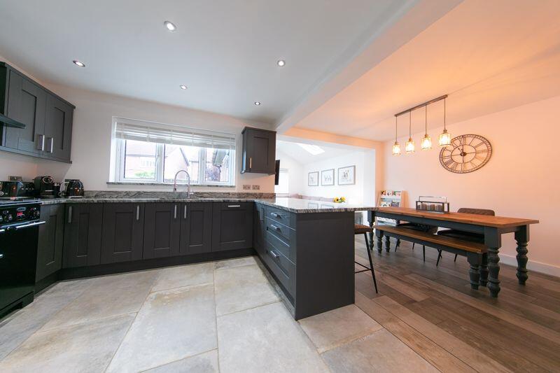 Kitchen, dining area and rear lounge