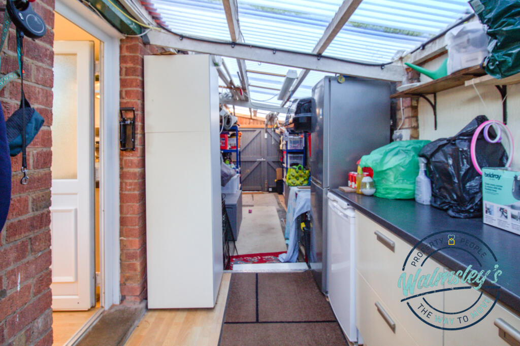 Utility &amp; lean to garage to side of property