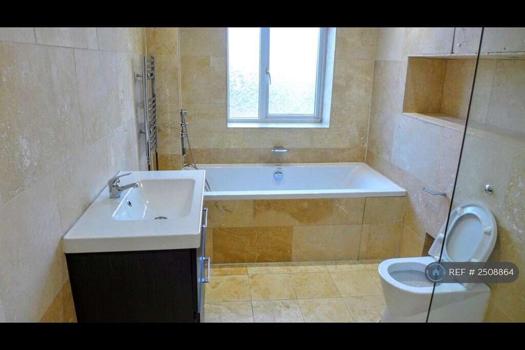 Modern Bathroom With Bath And Shower