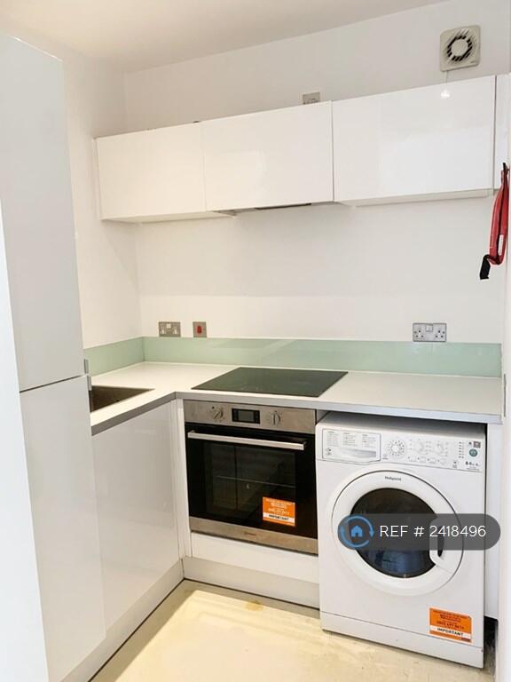 Modern Kitchen With Induction Hob, Fridge &amp; Washer