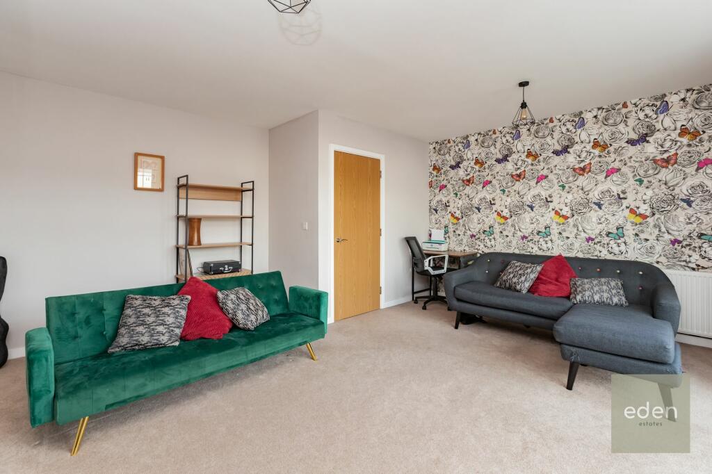 LIVING ROOM ONTO BALCONY