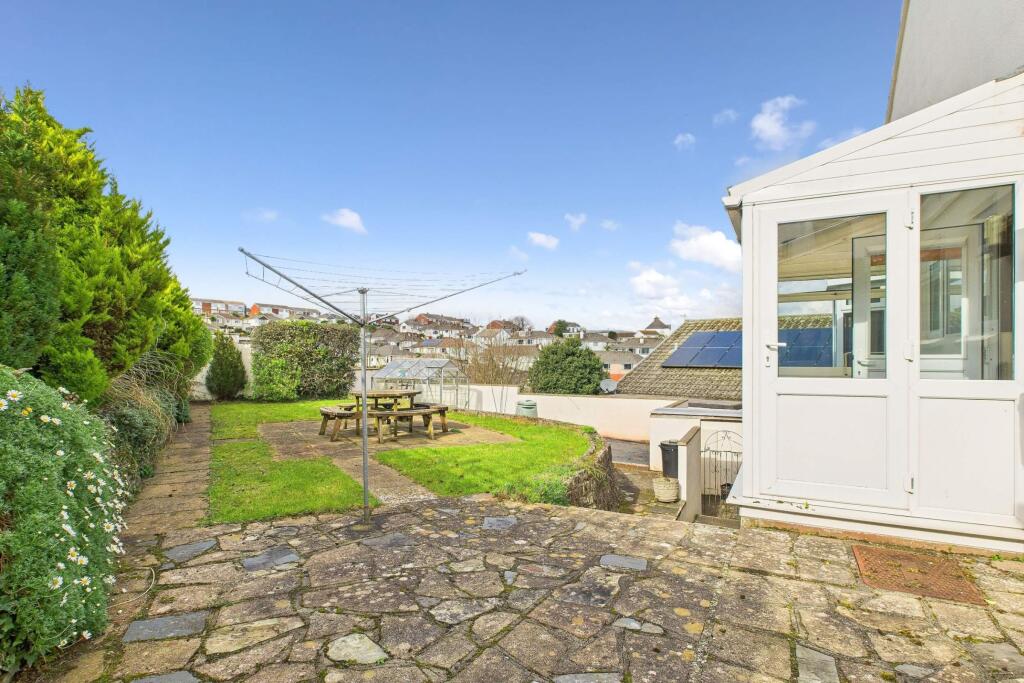 Rear garden with patio, lawn &amp; sunroom access